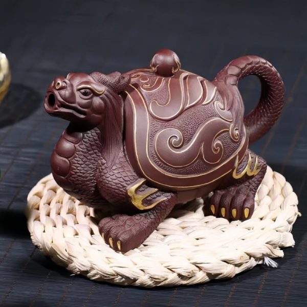 3-28.jpg Unique Gilding Dragon Turtle Shaped Teapot with Dragon Ball Twist Made from Yixing Purple Clay