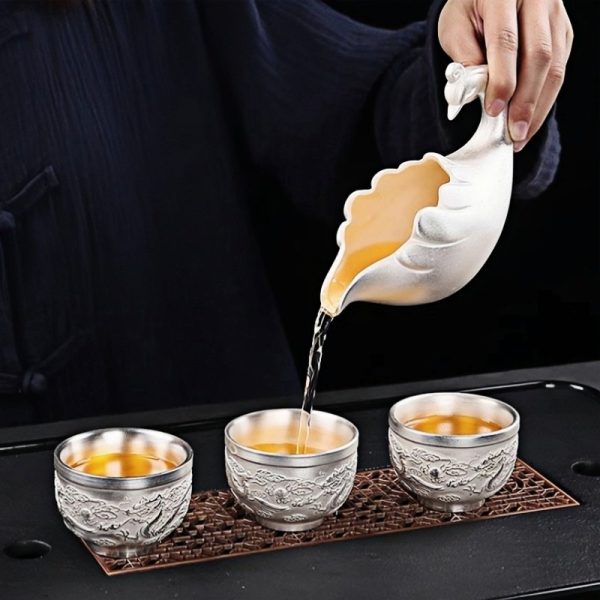 b-50.jpg Majestic Chinese Handmade Ceramic Gongfu Tea Cup Set with Silver Dragon Phoenix Lazy Semi-Automatic Design